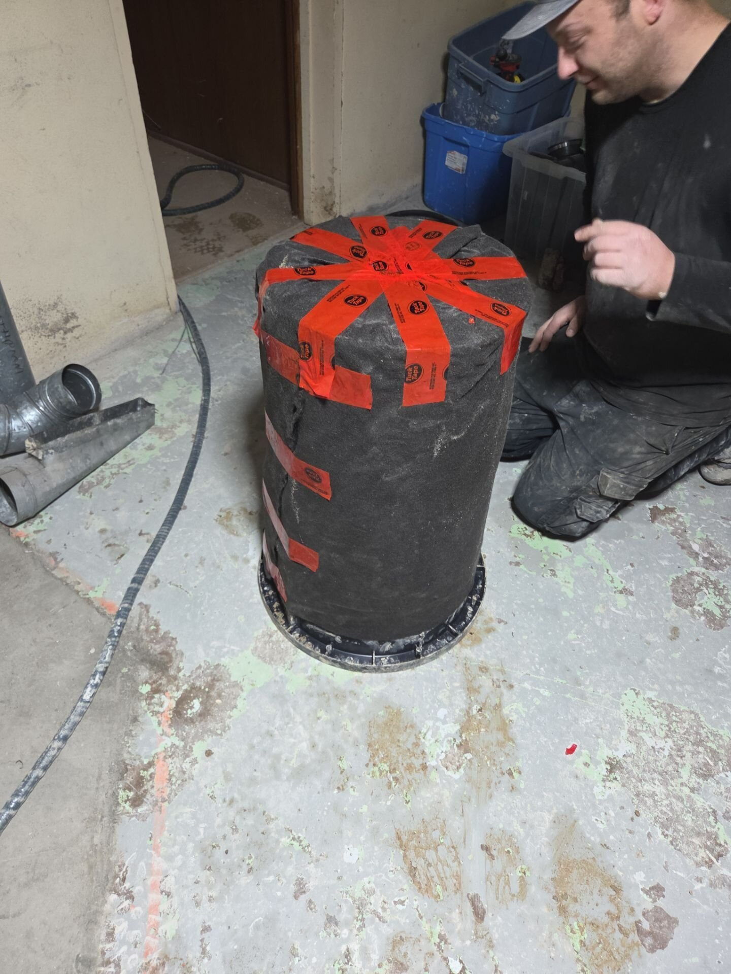 Sump basin piping | Sump pump replacement, Kitchener-Waterloo Einwechter plumber fitting new drain piping to a sump basin in a basement, Kitchener-Waterloo