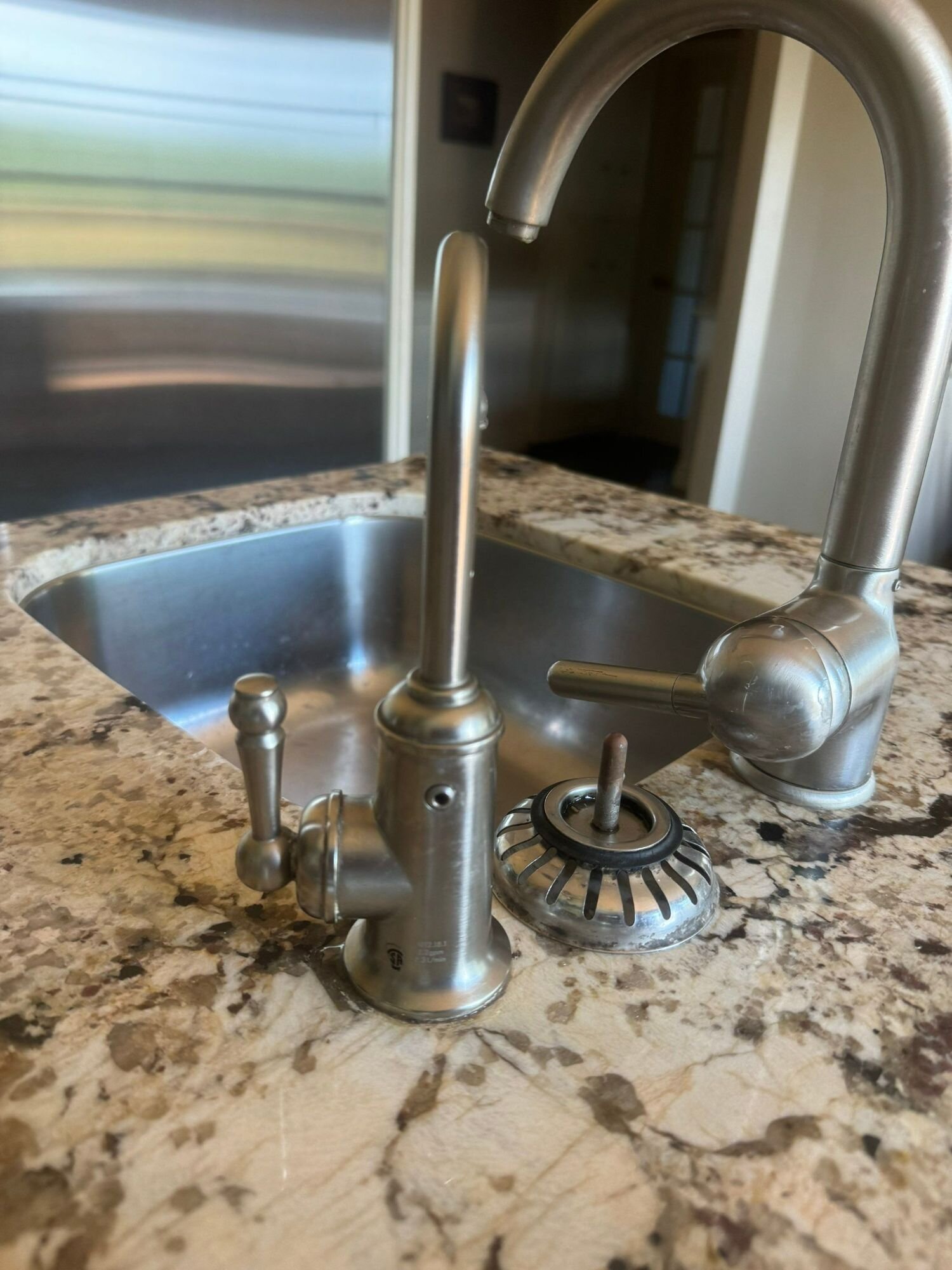 Dedicated drinking-water tap installed on a granite counter – reverse osmosis installation, Einwechter Plumbing & Heating, Kitchener-Waterloo