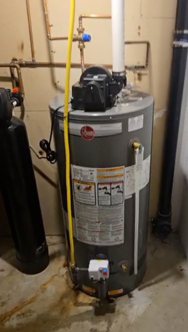 Power-vented gas water heater installed by Einwechter Plumbing & Heating in a Kitchener-Waterloo home