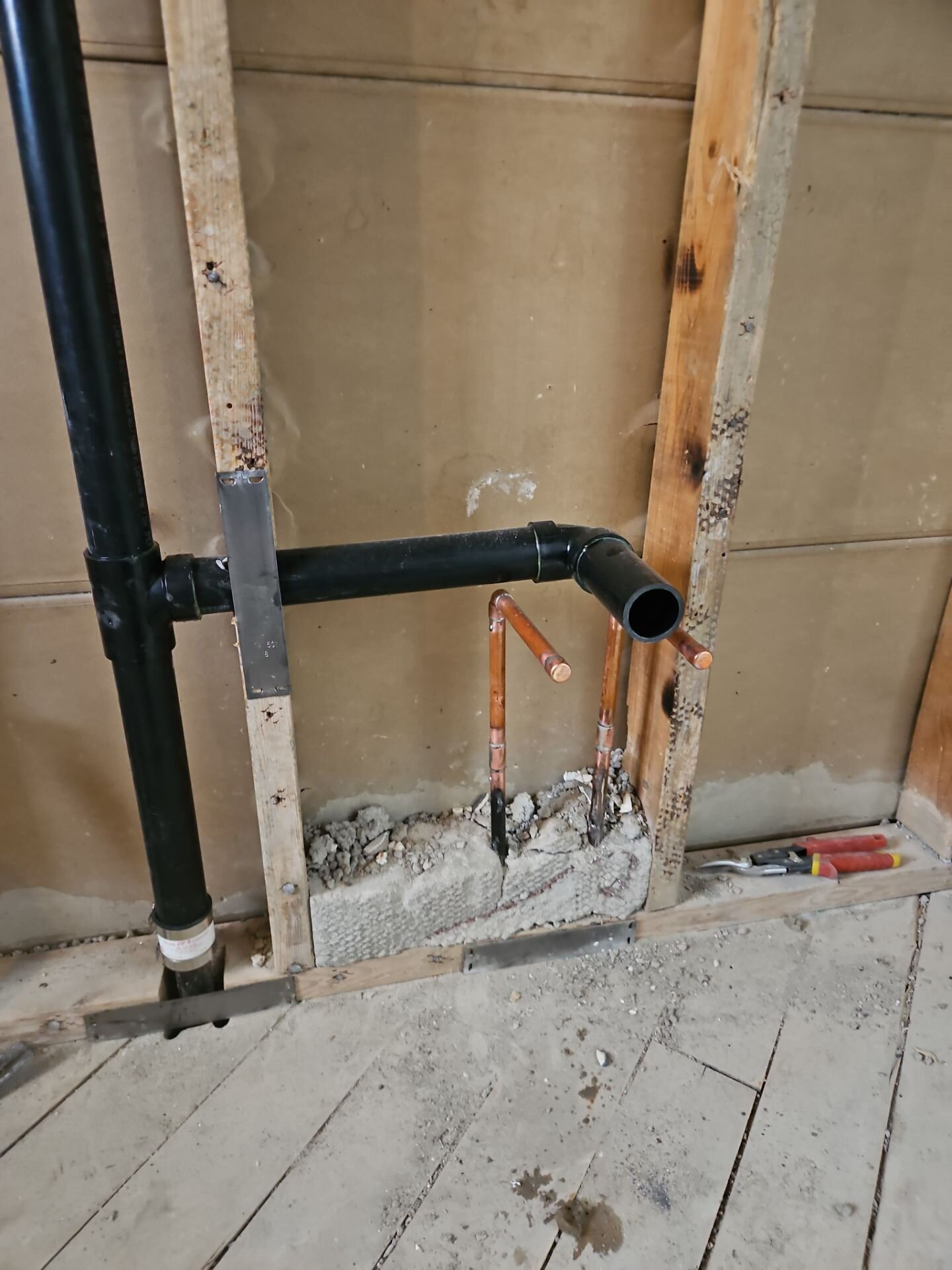 Wall opened for renovation plumbing | Renovation plumbing, Kitchener-Waterloo Wall opened during a bathroom renovation, with a new ABS drain and vent and copper water lines run to the new fixture – renovation plumbing, Einwechter Plumbing & Heating, Kitchener-Waterloo