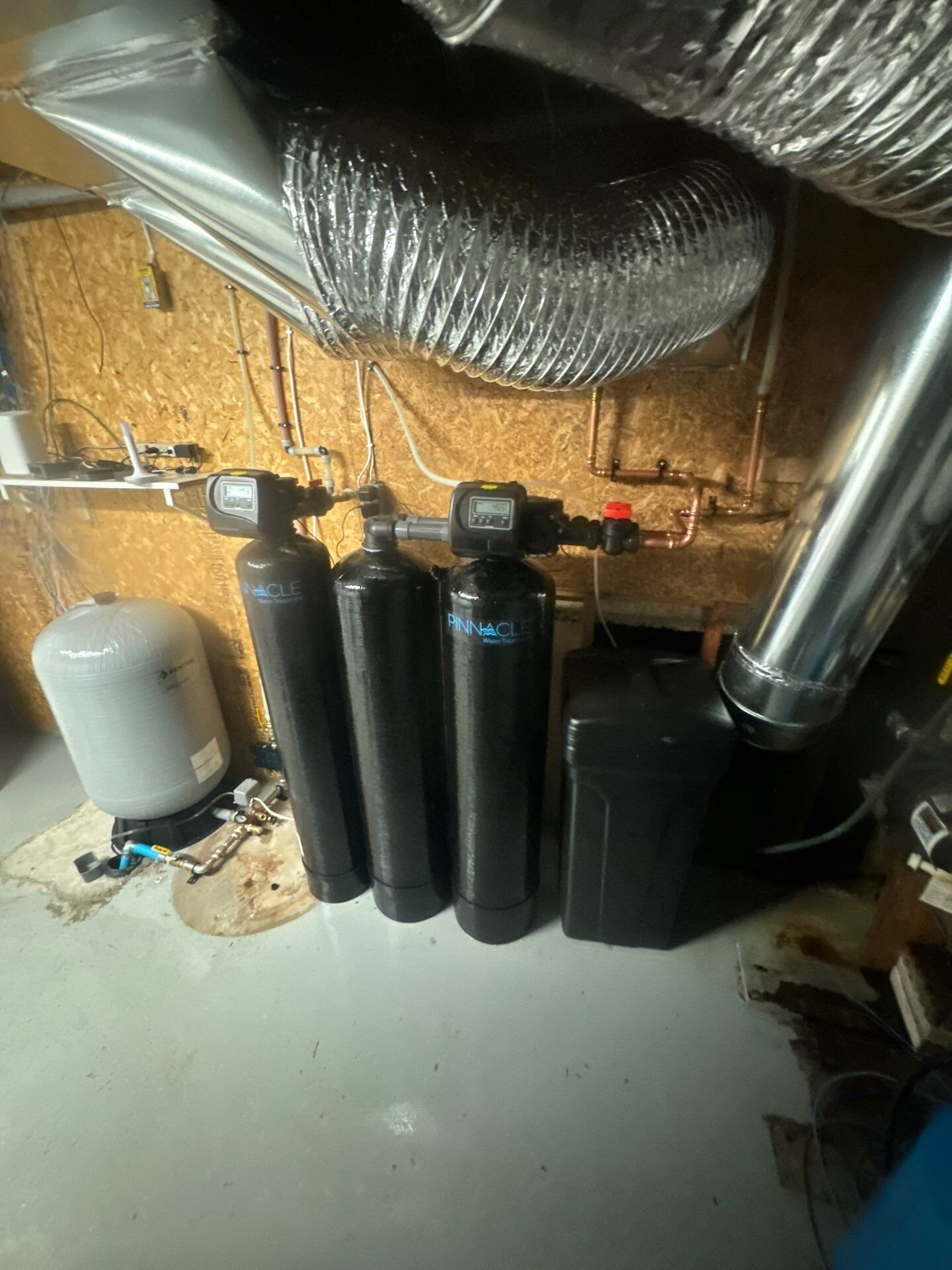 Pinnacle iron filter and water softener with brine tank installed by Einwechter | Whole-home water filtration, Kitchener-Waterloo Pinnacle iron filter and water softener with brine tank installed by Einwechter Plumbing & Heating on a well water system, after the pressure tank, Kitchener-Waterloo