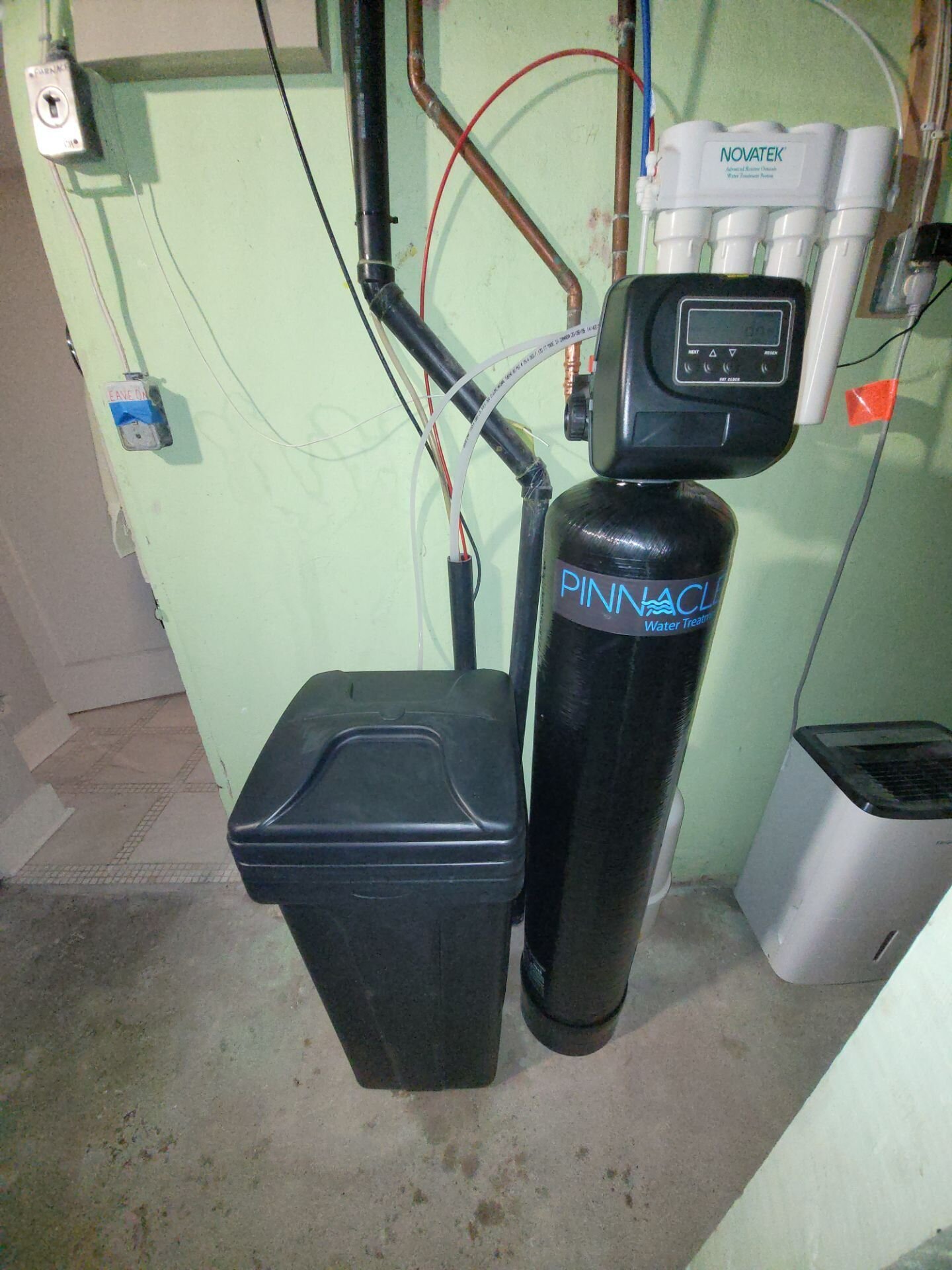 Pinnacle water softener with brine tank, installed by Einwechter in a basement b | Water softener service and repair, Kitchener-Waterloo Pinnacle water softener with brine tank, installed by Einwechter in a basement beside an RO system, Kitchener-Waterloo