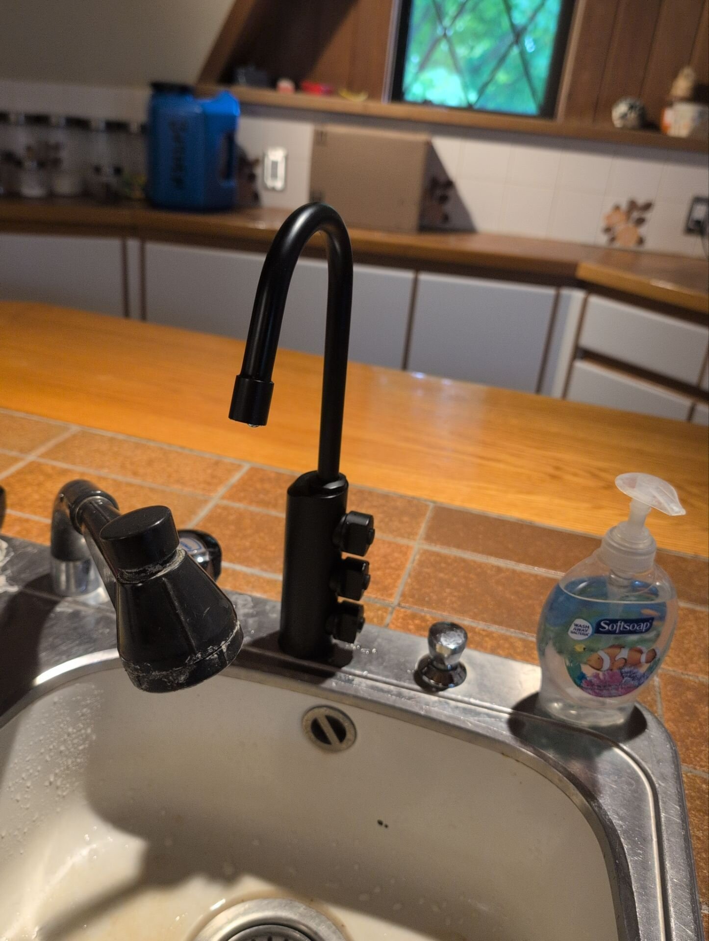 Reverse osmosis drinking water faucet with three buttons for chilled, room temperature and sparkling water, installed by Einwechter Plumbing & Heating, Kitchener-Waterloo