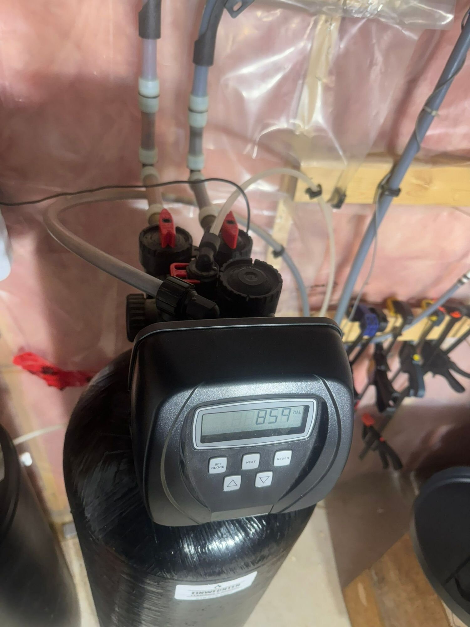 Close-up of a water softener control valve during a service visit | Water softener service and repair, Kitchener-Waterloo Close-up of a water softener control valve during a service visit – water softener service and repair, Einwechter Plumbing & Heating, Kitchener-Waterloo