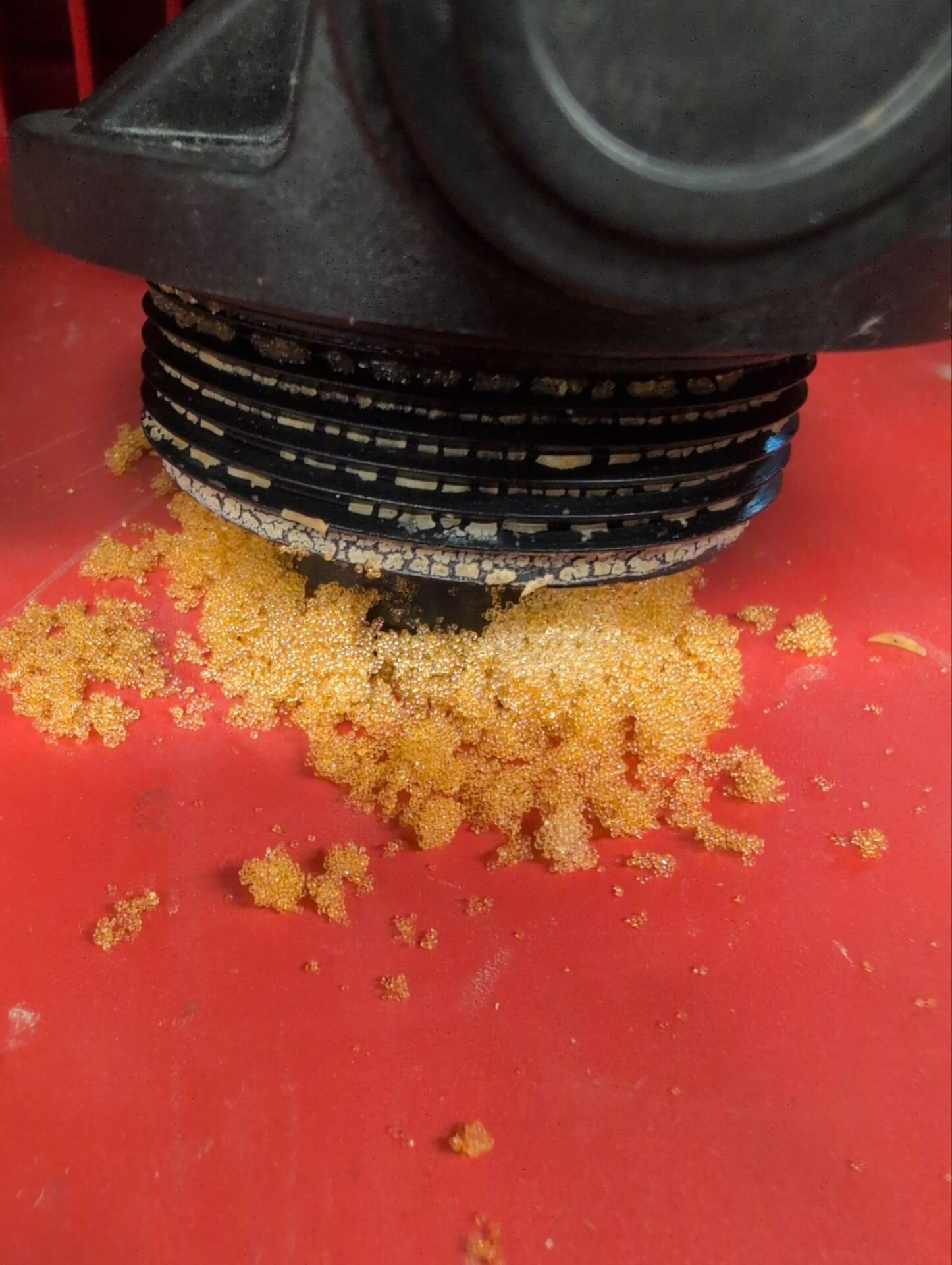 Softener resin beads around the top of a softener tank during a resin change | Water softener service and repair, Kitchener-Waterloo Softener resin beads around the top of a softener tank during a resin change – water softener service and repair, Einwechter Plumbing & Heating, Kitchener-Waterloo