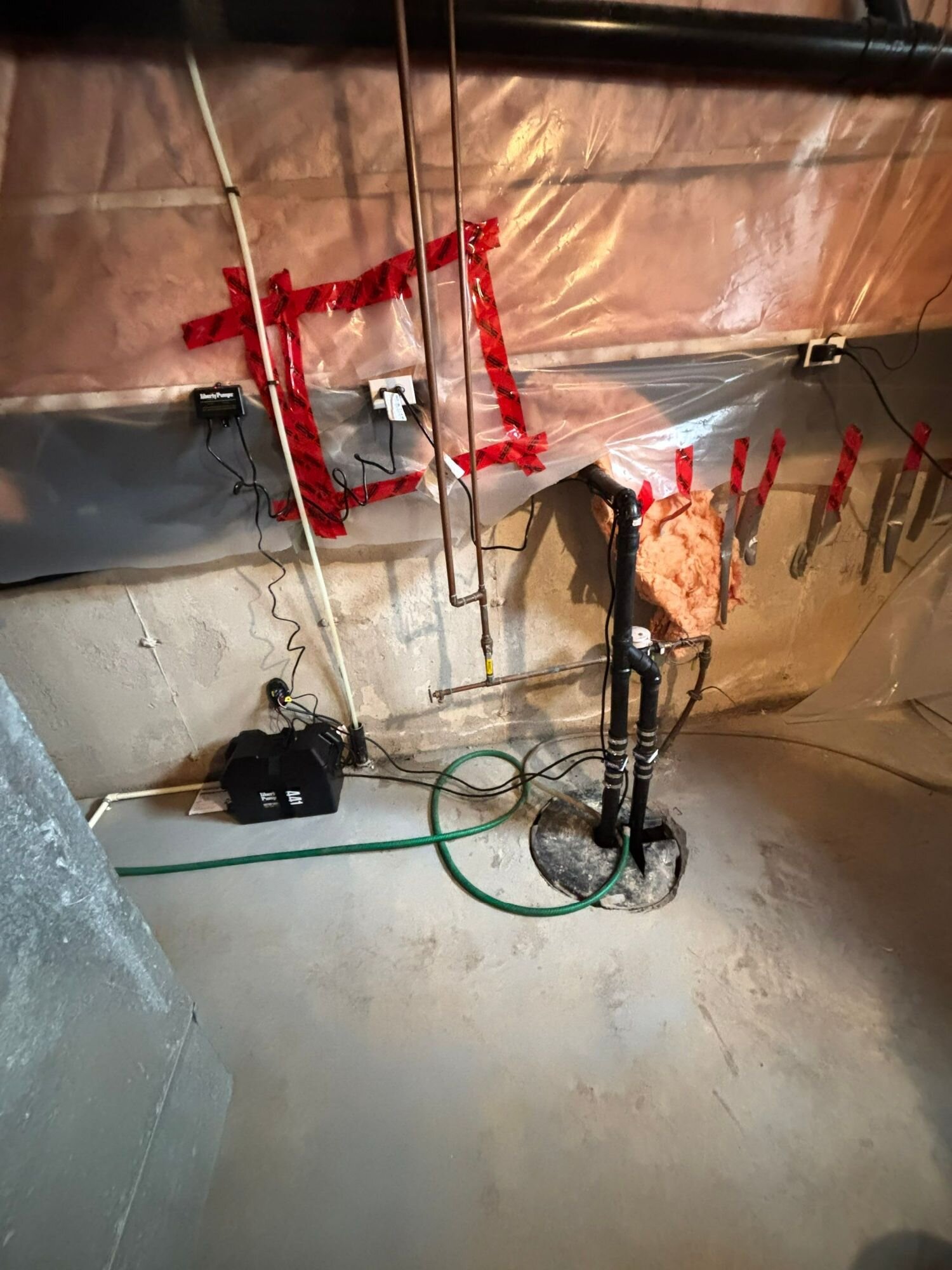 New sump pump and battery backup | Sump pump installation, Kitchener-Waterloo New sump pump with battery backup installed in an unfinished basement, Einwechter Plumbing & Heating, Kitchener-Waterloo